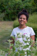 smiling ten year old girl in a park in summer 