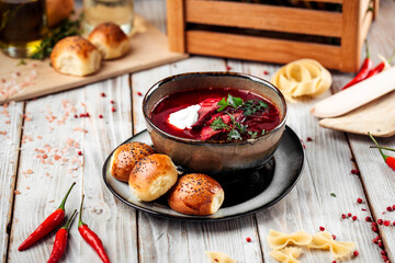 Russian beetroot soup borscht with beets and buns 