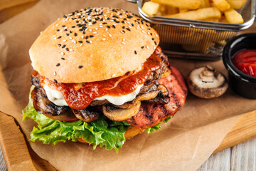 Closeup on appetizing burger with mushrooms