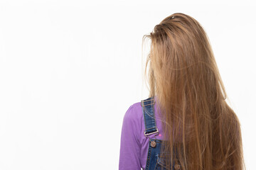 Naklejka premium Teen girl covered her face with long hair