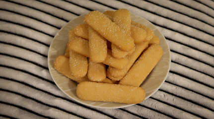 Delicious crispy biscuit coated with sugar crystals.
