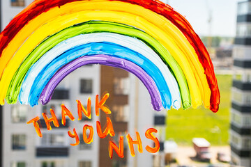 Rainbow on window during quarantine at home.