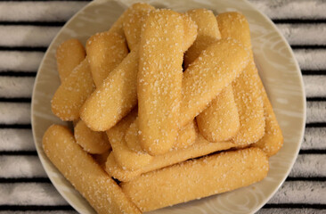 Delicious crispy biscuit coated with sugar crystals.