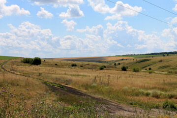 rural landscape with blue sky and clouds