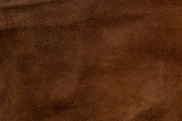 dark brown natural suede as a background close-up