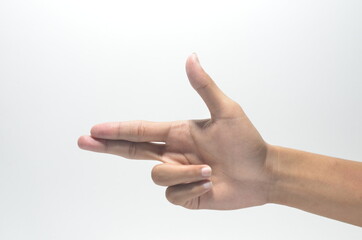 Human hand in shooting gesture isolated on white background