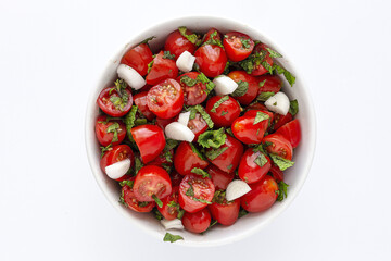Homemade cherry tomato salad with fresh onions, mint, olive oil and salt