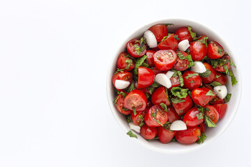 Homemade cherry tomato salad with fresh onions, mint, olive oil and salt