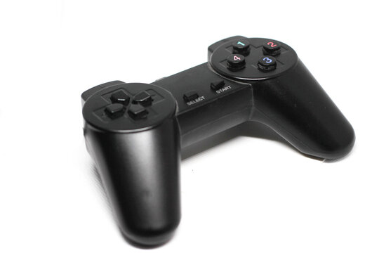 Isolated black game controller.