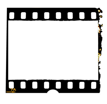 Old 35mm film frame with burned edge on white
