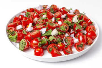 Homemade cherry tomato salad with fresh onions, mint, olive oil and salt