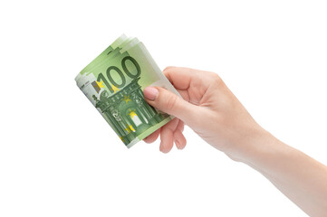 Folded euro bills in woman's hand. Isolated on white.