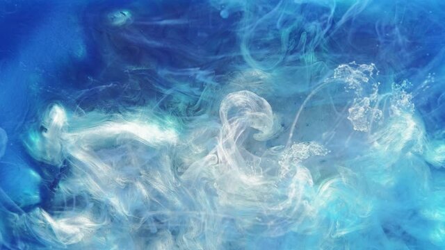 Color ink splash. Occult spell. Blue white fog cloud spreading abstract background.