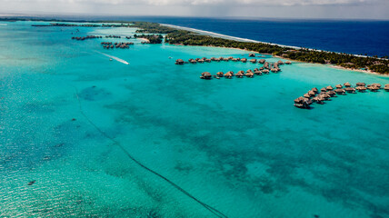 aerial view upon island resort and tropical island