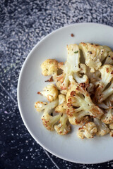 cauliflower in  at the wooden table