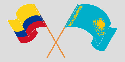 Crossed and waving flags of Colombia and Kazakhstan