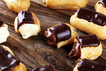Traditional French dessert. Eclair with chocolate icing. Pastery dessert concept