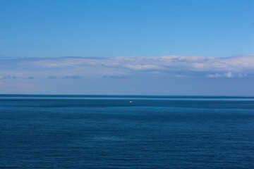 Fototapeta na wymiar Beautiful ocean background. Blue background of the sea. Nature. Rest by the sea. Blue sky.