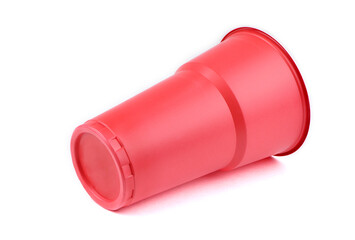Red plastic cup isolated on white background. Plastic glass
