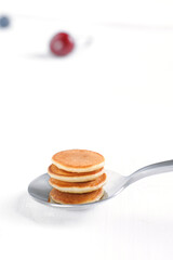 Trendy pancake cereal on the white background.