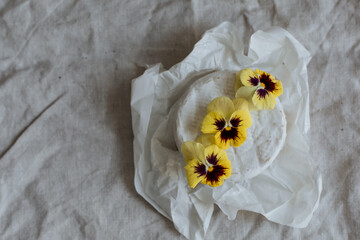 Camembert cheese on a linen napkin
