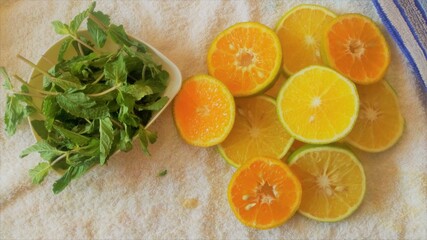 fresh citrus Melissa and oranges slice