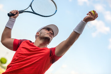 Young man playing tennis.