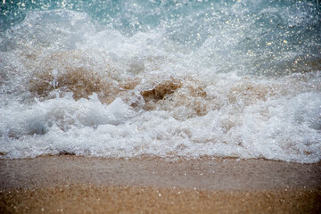 Spoondrift gradient from sand to sea water