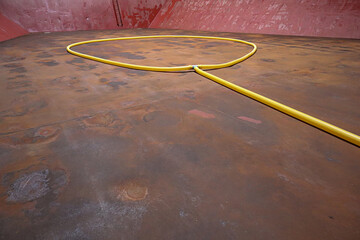 Yellow pipes for fumigation inside cargo hold 