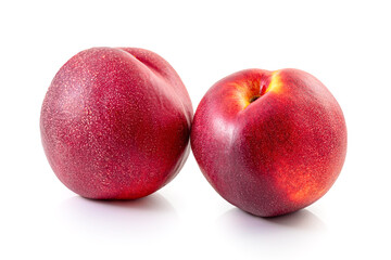 ripe nectarine peach fruits isolated on white