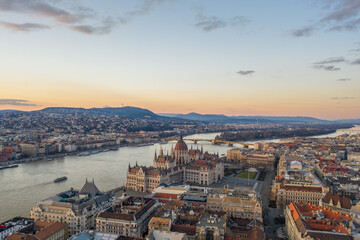 Aerial drone shot of Hungarian Parliament Kossuth Square by Danube river in Budapest sunset
