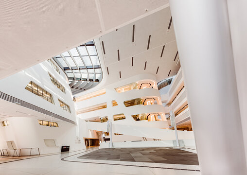 Vienna, Austria:  modern, futuristic white interior in library of the   Economic University of Vienna designed by Zaha Hadid Architects
