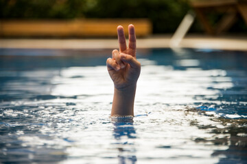 young man swimming in the pool