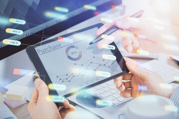 Multi exposure of man's hands holding and using a digital device and data theme drawing. Innovation concept.
