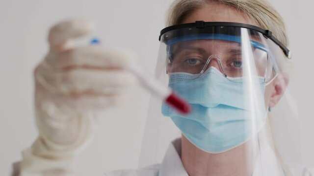 Covid 19 Coronavirus Scientists test for Covid-19 or Corona virus By using science tubes to research and treat illness in a laboratory or hospital. Medical treatment concepts