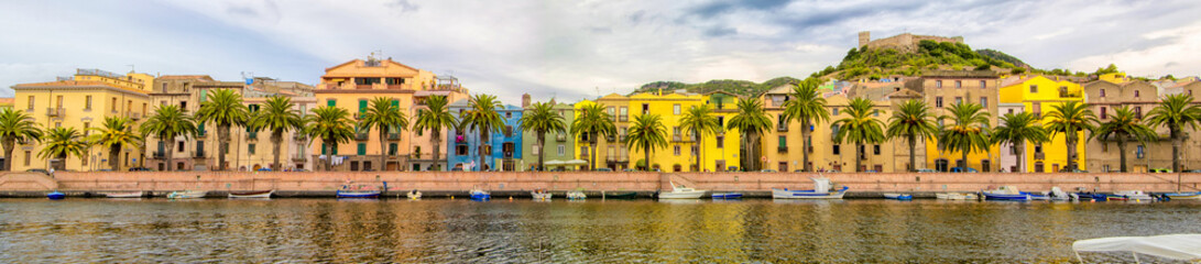 Big Panorama of  Bosa and river temo, Sardinia, Italy with Colorful houses, boats and palm trees. 