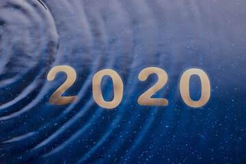 The year 2020 concept with water.