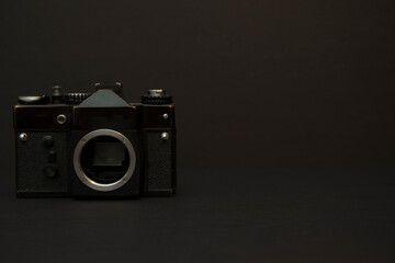 old photo camera on black