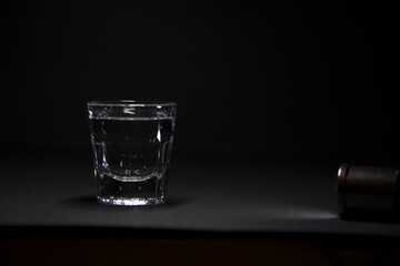 shot glass on black