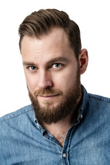 Handsome brownhaired guy with a nice beard and pretty eyes wearing ablue denim shirt looking...