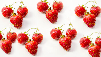 Obraz na płótnie Canvas Ripe strawberries on a white background,close-up.