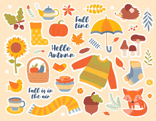 Set of autumn or fall seasonal icons with clothing, boots, food, fox, leaves and hot beverages interspersed with text, colored vector illustration