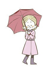 傘をさしているシニア女性