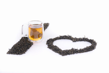 green tea in a transparent cup with a dried green tea