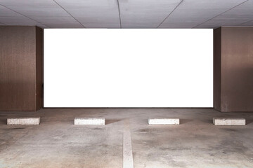Parking garage underground interior with blank billboard