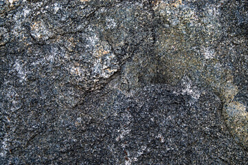 texture of a large mountain heavy stone with different colors with an unusual relief