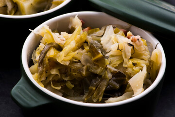 Stew of white cabbage and bacon. Vegetables, background