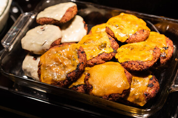 grilled hamburgers with cheese on top 