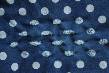 Hole and Threads on dot Denim Jeans