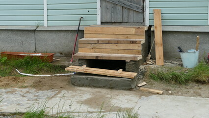 repair of the wooden porch of the house